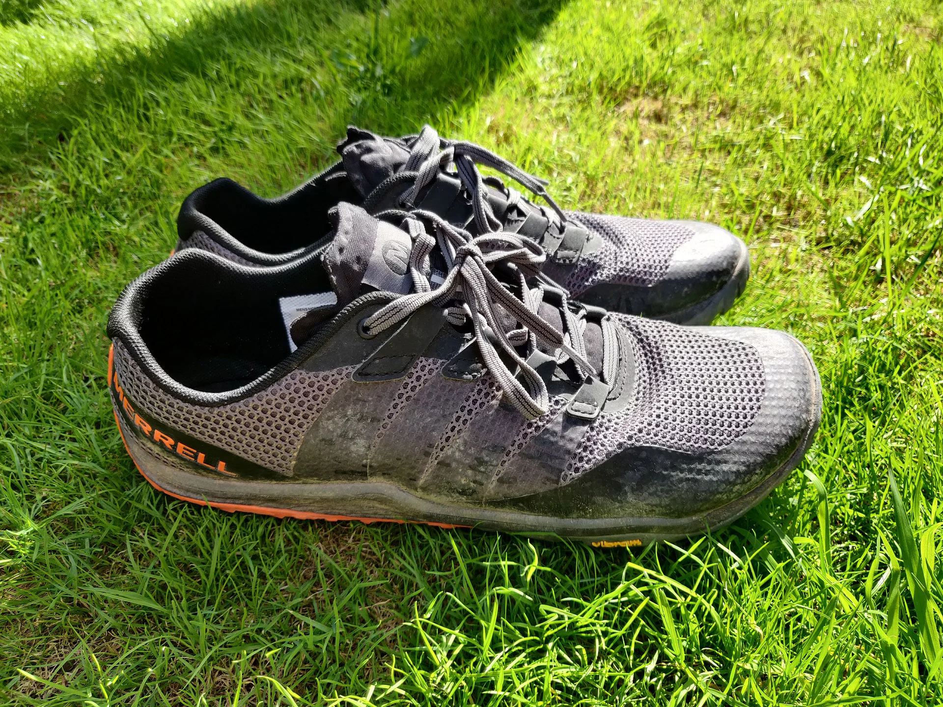 merrell trail glove 5 fitness-lightweight-trail running shoes on grass