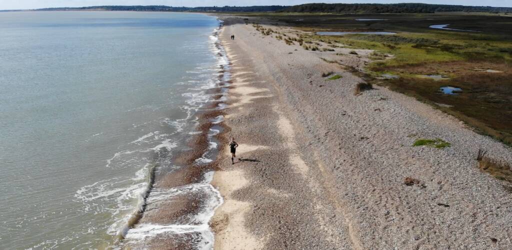 coastal trail running near Dunwich, Suffolk. A view of the beach from the air, taken by DJI Mavic Air quad copter.