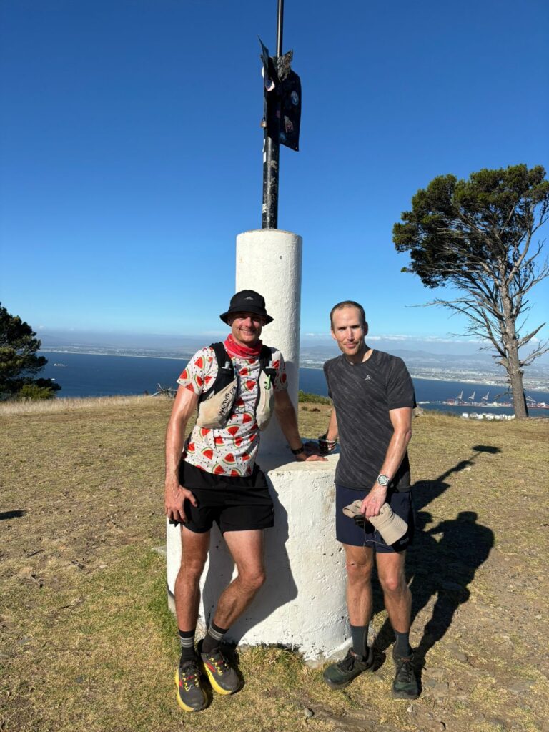 Standing at the Signal Hill beacon at the end of the 13 Peaks Challenge.