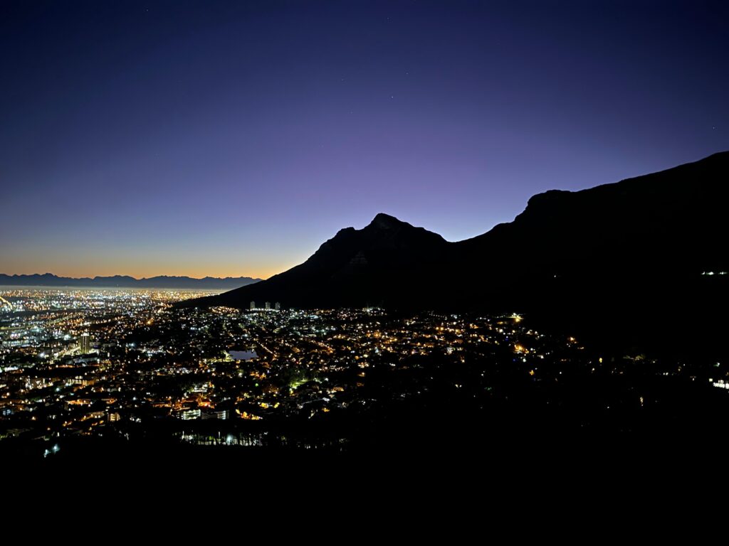 13 Peaks Challenge - view toward Cape Town and the mountains in the early dawn hours.